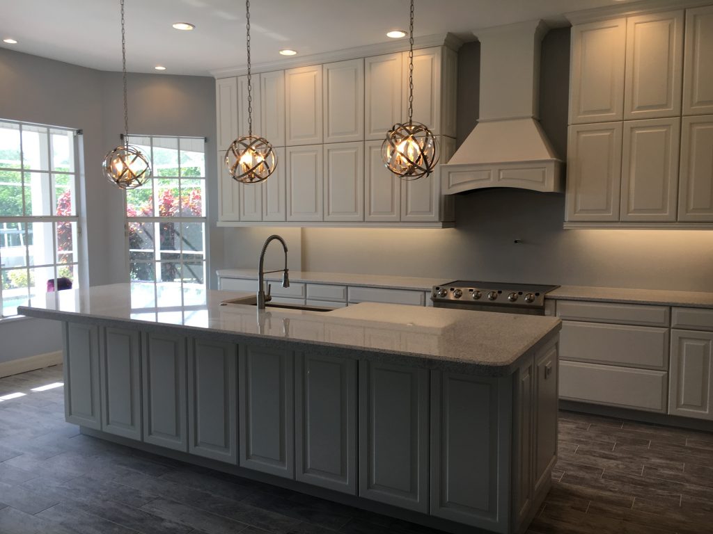 newly renovated kitchen with white cabinetry