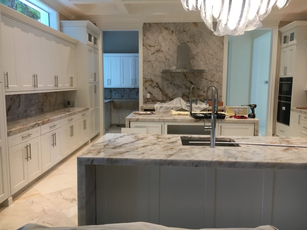 kitchen with gray marble countertops